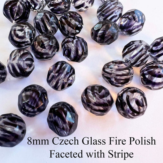 8mm Czech Fire Polish Faceted Clear with Black Stripe (Qty 25)
